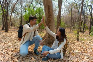 A couple who enjoy hiking and adventure.