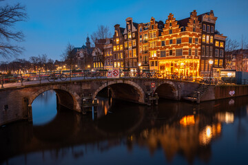 Bridge and architecture in Amsterdam, Holland at night