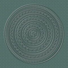 Round pattern embossed on imitation of thick green cardboard. Mandala. 