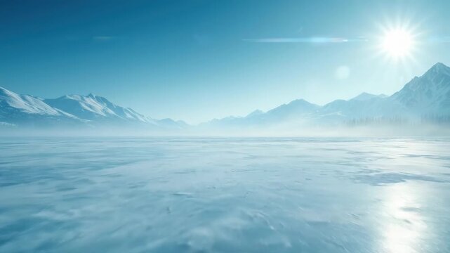 Vast arctic expanse, glistening frozen lake reflecting bright winter sun. Majestic snow clad mountains rise under a clear blue sky. Cold pristine nature panorama.