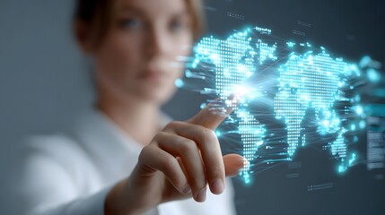 A person s finger interacts with a luminous blue digital projection of the world map illustrating global connectivity and data networks