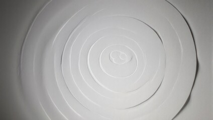 Abstract monochrome background with concentric paper circles.