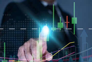 Businessman hand interacting with a digital stock market chart. Investment, trade and finance and banking concept.