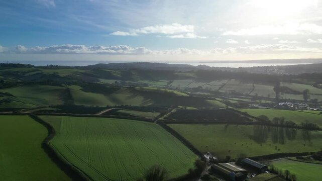 Coffinswell, South Devon, England: DRONE VIEWS: A solar panel farm surrounded by open countryside and farmland. Solar power is an integral part of the UK government's strategy for achieving net zero.