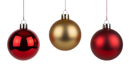 Three festive christmas ornaments one gold and two red hanging and isolated on a transparent background for holiday decoration isolated on transparent background