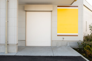 Large blank billboard on a street wall, banners with room to add your own text