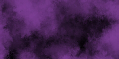 Obraz premium purple fire on a black background . Chaotic mixing smoke creates abstract patterns on a black background .abstract black background with purple smoke and copy space . 