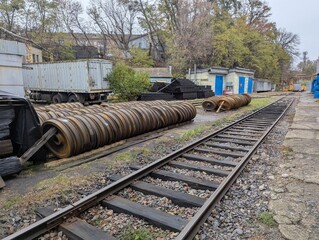 An open-air warehouse for train car wheels