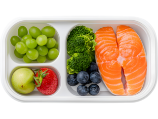 Colorful meal prep box filled with fresh veggies, proteins, and greens, ideal for healthy eating concepts, diet planning, nutrition, and balanced lifestyle visuals.