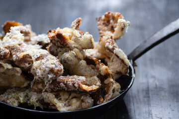 pan of cheesy italian potato skin crisps