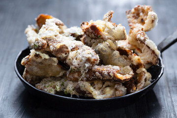 pan of cheesy italian potato skin crisps