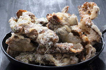 pan of cheesy italian potato skin crisps