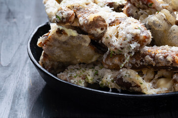 pan of cheesy italian potato skin crisps