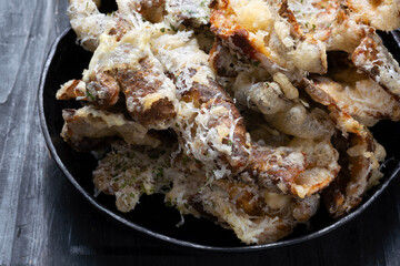 pan of cheesy italian potato skin crisps