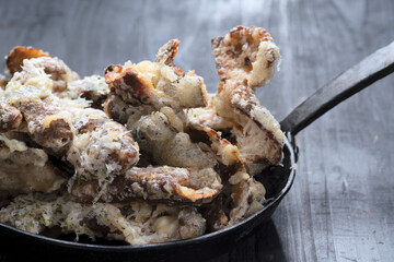 pan of cheesy italian potato skin crisps