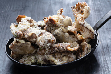 pan of cheesy italian potato skin crisps