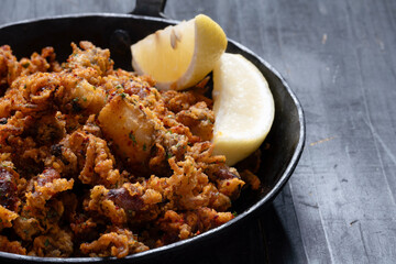 pan of crispy fried baby calamari side dish