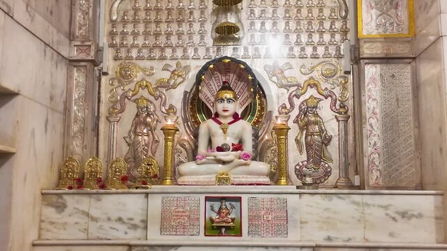 Interior of Jain Mandir with Intricate Karigari &ndash; Beautifully Carved Pillars, Sacred Tirthankar Idols, and Traditional Indian Temple Architecture Showcasing Spiritual Art and Cultural Heritage