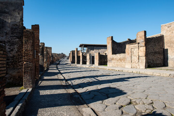 Cobbled stone street in an ancient Roman city ruin settlement