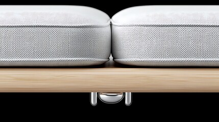 Modern minimalist interior design detail showcasing white cushions on a wooden frame with metallic