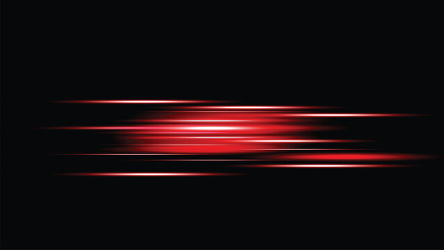 Red light streaks on a dark background with motion blur effect