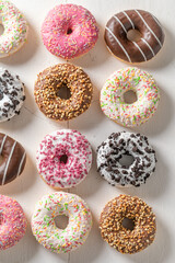 Yummy and fresh donuts as takeaway dessert.
