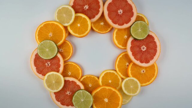 Rotating citrus mandala seamless fruit pattern background
