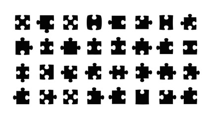 Naklejka premium Collection of Black Puzzle Pieces Arranged in Rows on a White Background