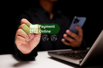 A person interacts with an online payment interface, highlighting digital transactions and modern finance using a smartphone and laptop.