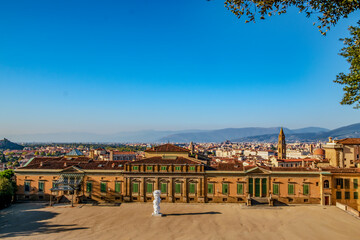Fototapeta premium Panoramic View of Historic City with Gardens and Cathedral