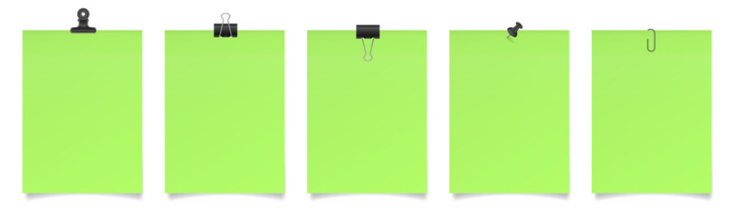 Set of large paper notes with binder clips, bulldog clip, paper clip and push pin. Neon green sheets of paper. Black holders	