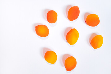 Chinese Preserved Fruit, Fresh red yellow Sweet Peach arranged artistically on a clean white background, showcasing colorful textures and playful design elements for festive celebrations