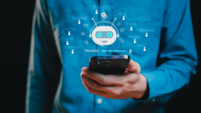 Businessman hold smartphone displaying a central AI Voicebot, chatbot multilingual language options, global customer service, instant translation, technology, and advanced communication solutions