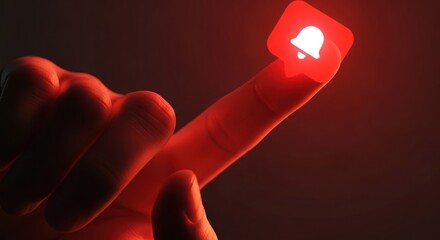 User's index finger activating dramatically lit, glowing red notification bell symbol on dark background, for digital urgency, important system alerts, social media engagement, critical