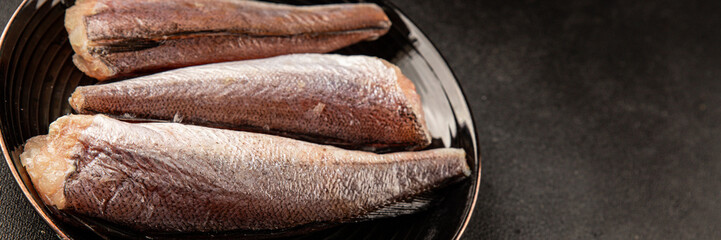 Hake raw fish seafood healthy food main course ingredient appetizer fresh delicious gourmet food table setting rustic food top view copy space pescatarian diet