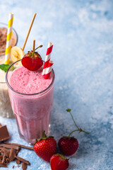 Milkshake from strawberry, banana and chocolate