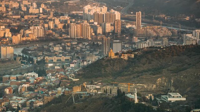 Tbilisi Georgia. Residential Quarters time lapse timelapse. time lapse timelapse elevated view Cityscape Famous Landmarks: Kartlis Deda Georgia mother Monument, Narikala Fortress, Tabor Monastery In