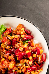 Mexican salad tuna, red beans, corn, peppers, vegetable oil seafood healthy food main course ingredient appetizer fresh tasty food table background country food top view copy space keto and paleo diet