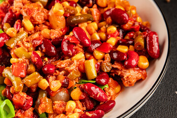 Mexican salad tuna, red beans, corn, peppers, vegetable oil seafood healthy food main course ingredient appetizer fresh tasty food table background country food top view copy space keto and paleo diet