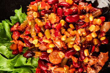 Mexican salad tuna, red beans, corn, peppers, vegetable oil seafood healthy food main course ingredient appetizer fresh tasty food table background country food top view copy space keto and paleo diet