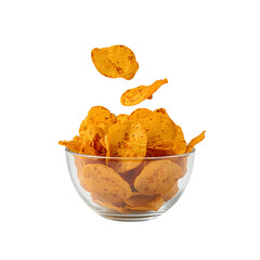 Crispy potato chips overflowing a glass bowl isolated on transparent background