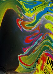 Colorful abstract background. Chaotic bright spots on a black background.