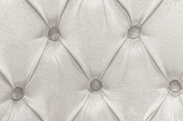 Cloud Dancer color 2026 trend color tufted upholstery texture background