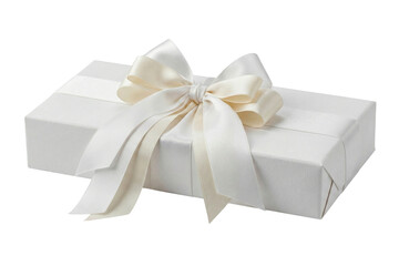 A beautifully wrapped white gift box with an elegant cream ribbon bow, isolated on a clean background