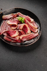 Duck breast slice magret smoked meat poultry meat food tasty snack fresh delicious gourmet food background on the table rustic food top view copy space