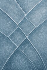 Fototapeta premium Abstract frozen ice crack pattern with geometric lines, cool blue texture background for winter design.