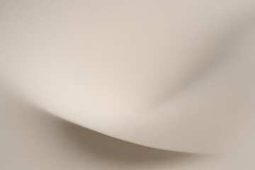 Minimal beige abstract background with soft curved shadow and copy space for branding and mockups.