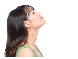 Side profile of a woman with geometric earrings and closed eyes