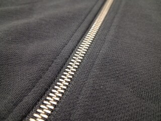 Closeup of zipper on fabric © FizzyArt