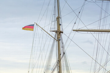 German national flag on historic sailing ship mast